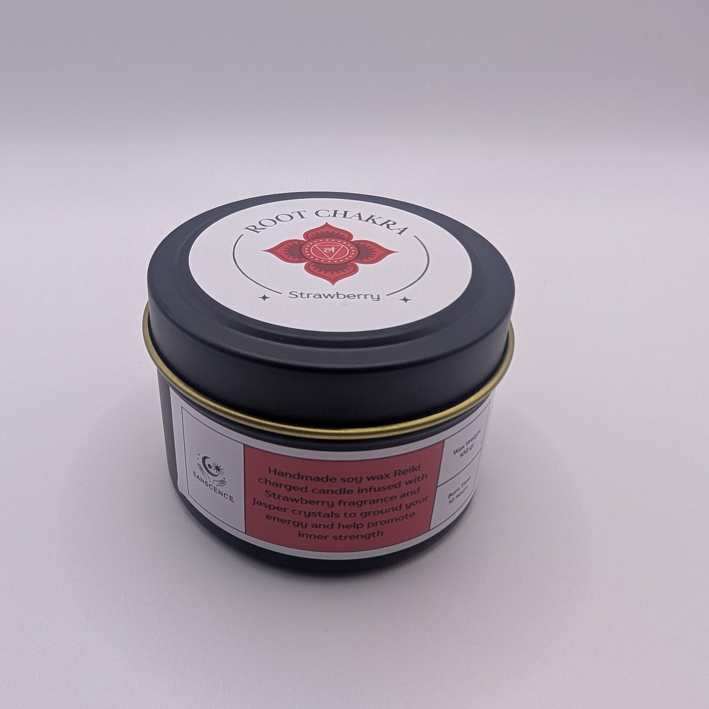 Small container with a black lid and red label on a gray background