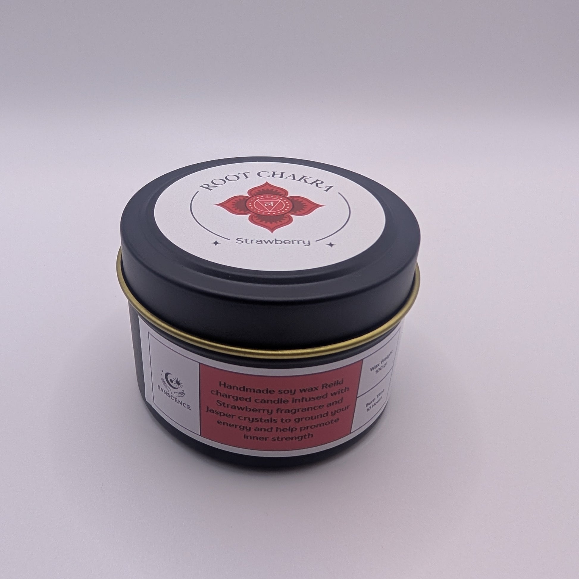 Small container with a black lid and red label on a gray background