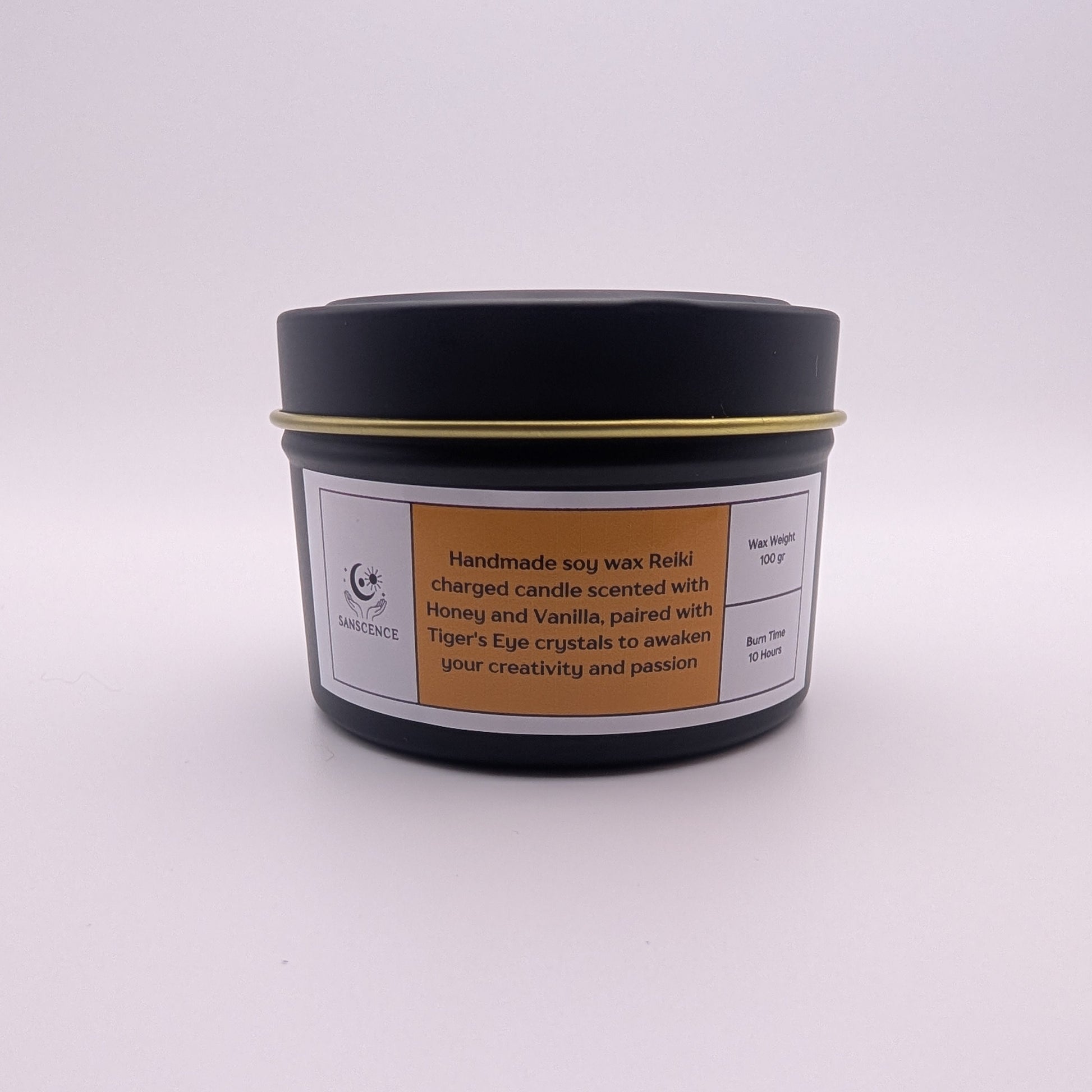 Candle jar with a label on a white background