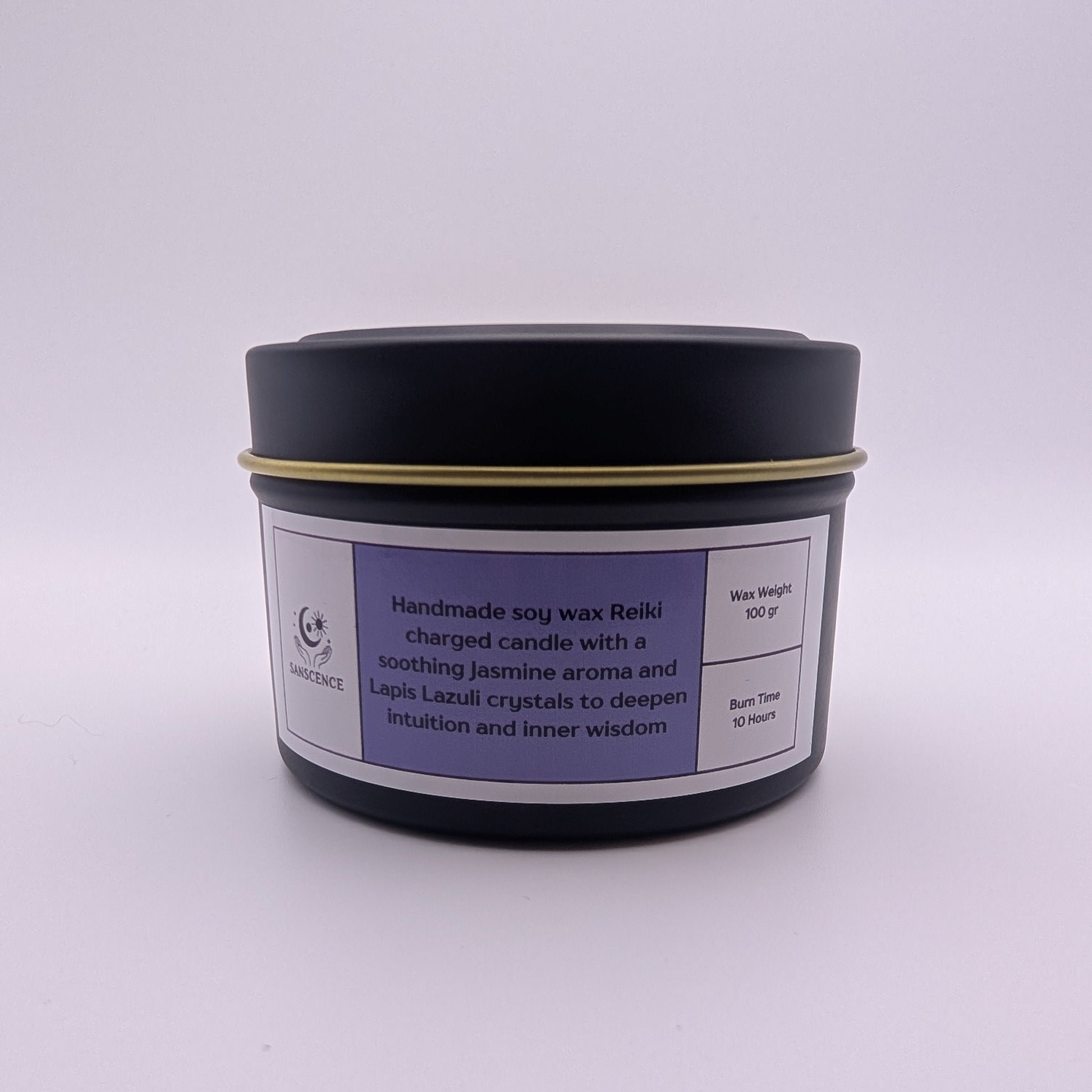 Black candle jar with a purple label on a white background