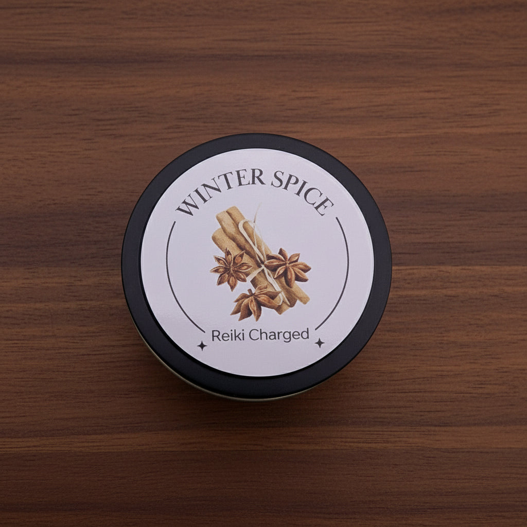Tin labeled 'Winter Spice' with cinnamon sticks and star anise on a light purple background