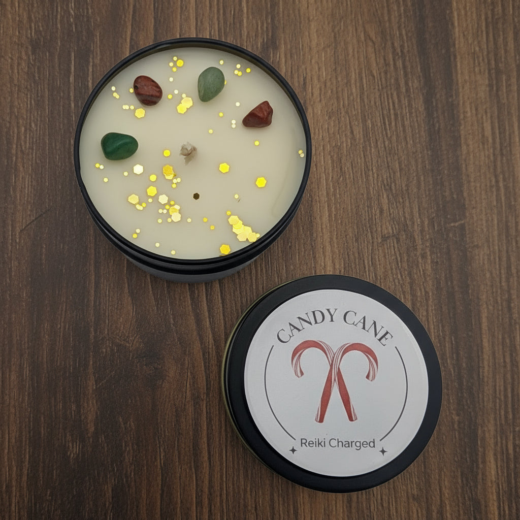 Candle with decorative elements and a branded lid on a gray background