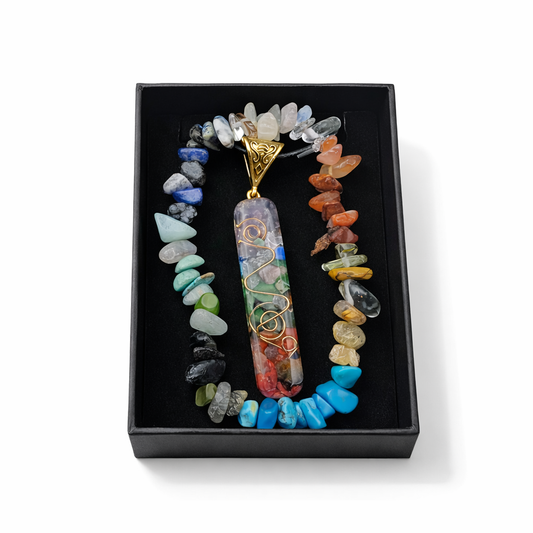 Colorful beaded necklace with a pendant in a black box on a white background