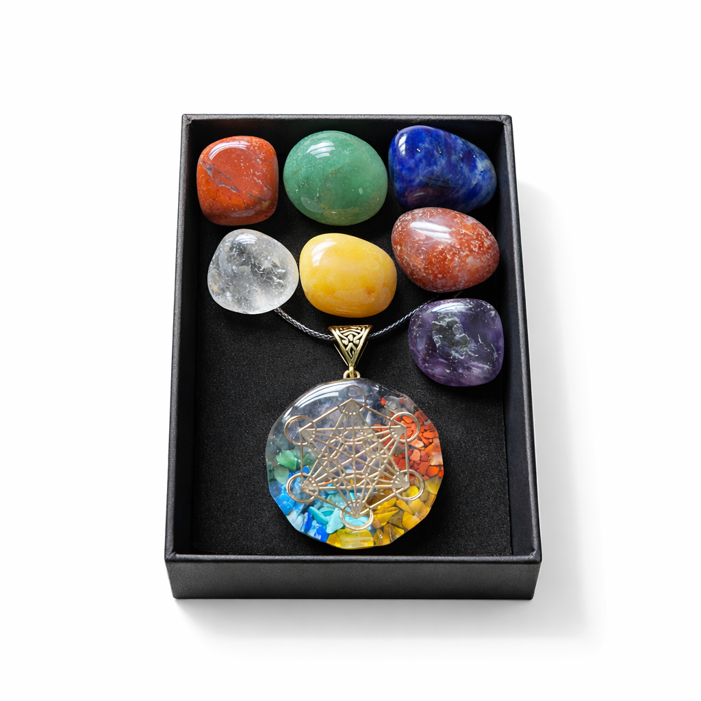 Chakra stone set with a central pendant in a black box on a white background