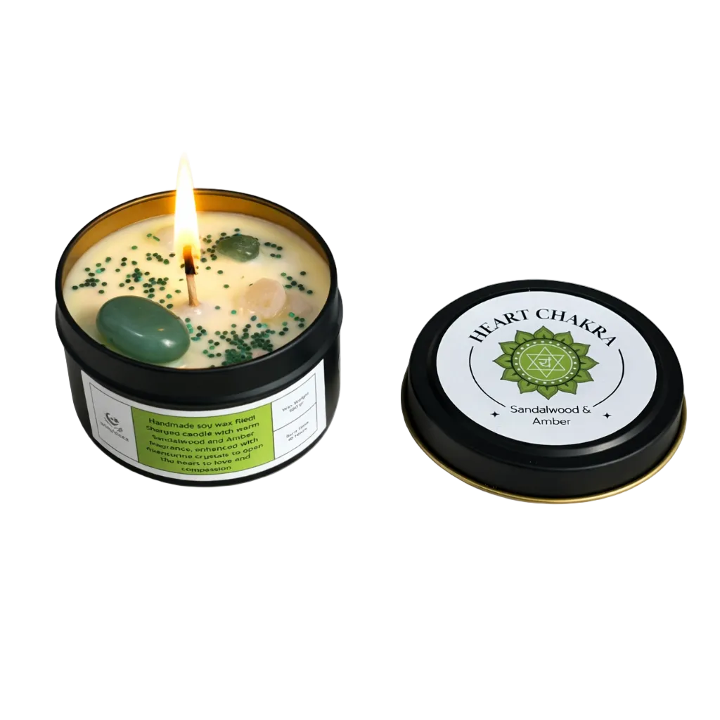 Candle in a container with a lit wick, next to its lid on a white background