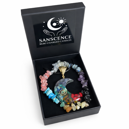 Colorful beaded necklace with a moon pendant in a black box labeled 'Sanscence'.